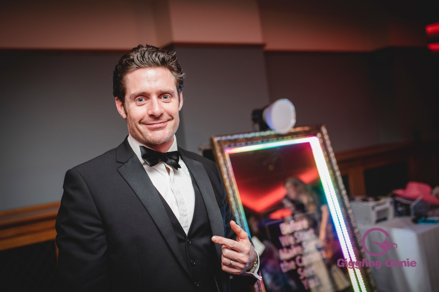 Guest enjoying a Magic Mirror at a corporate event in Surrey